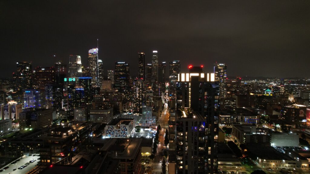 La La Land Los Angeles A breathtaking aerial view of Los Angeles downtown skyline illuminated at night.